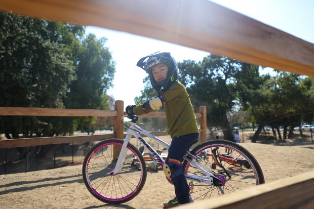 Julian Liao, 6, of Campbell, rides his bike on the BMX course at Calabazas Park in San Jose, Calif., on Wednesday, Aug. 12, 2026. (Shae Hammond/Bay Area News Group)