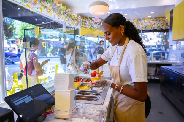 Employee Abby Mulugeta makes a strawberry soft scoop while working at Milky Flakes in Walnut Creek, Calif., on Friday, July 31, 2026. (Jose Carlos Fajardo/Bay Area News Group)