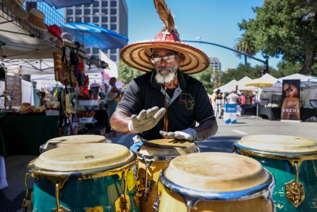Andrew Reynolds, of San Jose, plays congas during the San Jose Jazz Summer Fest at the Plaza de Cesar Chavez in San Jose in 2023. (Ray Chavez/Bay Area News Group)