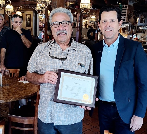 Pasquale "Pat" Panzica, left, receives a Certificate of Recognition from San Jose City Councilmember Michael Mulcahy at Kukar's House of Pizza on Friday, Aug. 14, 2026. (Courtesy office of Michael Mulcahy)