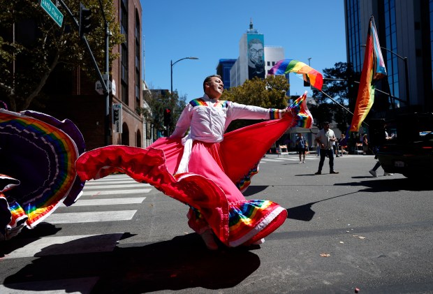 Dancers with Folclórico Colibrí, an LGBTQ+ Mexican Folklorico organization, dance while heading south on Market Street during the Silicon Valley PRIDE Parade in downtown San Jose, Calif., on Sunday, Aug. 30, 2026. (Nhat V. Meyer/Bay Area News Group)