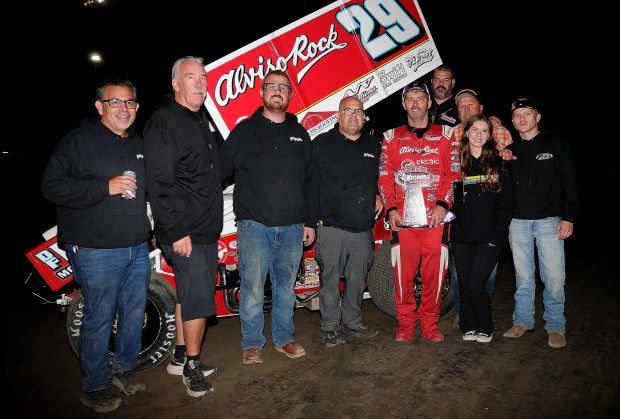 San Jose's Bud Kaeding, third from right, celebrates with friends and family after his sprint car feature win at Watsonville Speedway on Friday night. (Top Dawg Photos)