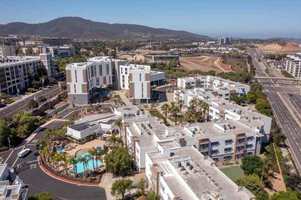 High angle view looking west of some of the dorm buildings at California State University San Marcos. Close at right is University Village built in 2003, with the new adjacent Black Oak Hall at upper/middle left. At far right is Barham Drive. CHARLIE NEUMAN / FOR THE U-T