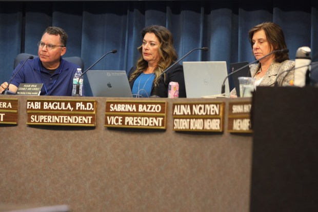 Board members Richard Barrera and Sabrina Bazzo, along with Superintendent Fabi Bagula, listen to people speak at the San Diego Unified School District headquarters on Tuesday, March 3, 2026. (Kristian Carreon / The San Diego Union-Tribune)