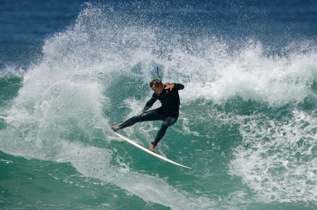 John Maher does a cutback while surfing on a wave in La Jolla during an extended Beach Hazards Statement for high surf on June 10, 2026 in San Diego, CA.  (K.C. Alfred / The San Diego Union-Tribune)