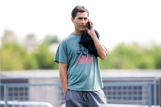 President of baseball operations A.J. Preller speaks on the phone at the Peoria Sports Complex on Tuesday, Feb. 10, 2026 in Peoria, Ariz. (Meg McLaughlin / The San Diego Union-Tribune)