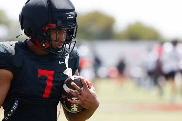 San Diego State running back Lucky Sutton wearing No. 7 seems only fitting, but he had to prove he was worthy. (Meg McLaughlin / The San Diego Union-Tribune)