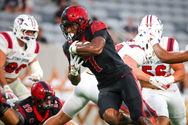 San Diego State running back Lucky Sutton rushed for 1,297 yards and 10 touchdowns last season. (Meg McLaughlin / The San Diego Union-Tribune)