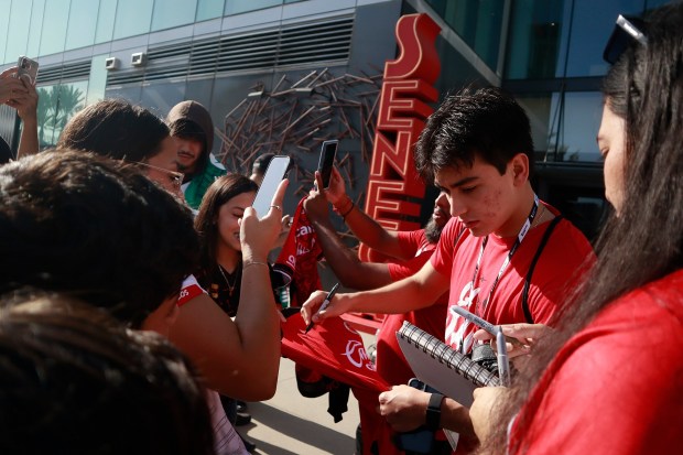 Tijuana Xolos star Gilberto Mora signs autographs for fans before Sunday's Leagues Cup match against San Diego FC at Snapdragon Stadium. (Tijuana Xolos)