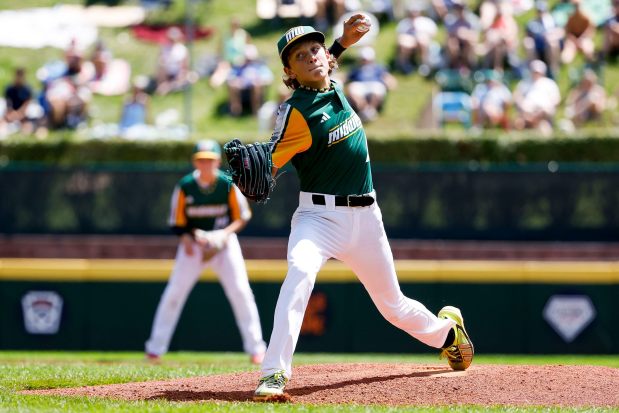 Davenport Northwest's Cooper Thissen #15, representing the Midwest Region, pitches against Sweetwater Valley, representing the West Region, during the 2026 Little League World Series at Howard J. Lamade Stadium on Friday, Aug. 21, 2026 in South Williamsport, Pennsylvania. (Meg McLaughlin / The San Diego Union-Tribune)
