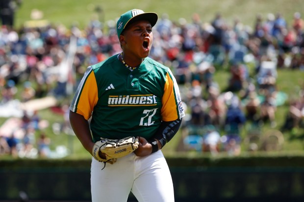Davenport Northwest's Anthony Johnson Jr. #22, representing the Midwest Region, celebrates after defeating Sweetwater Valley, representing the West Region, during the 2026 Little League World Series at Howard J. Lamade Stadium on Friday, Aug. 21, 2026 in South Williamsport, Pennsylvania. (Meg McLaughlin / The San Diego Union-Tribune)