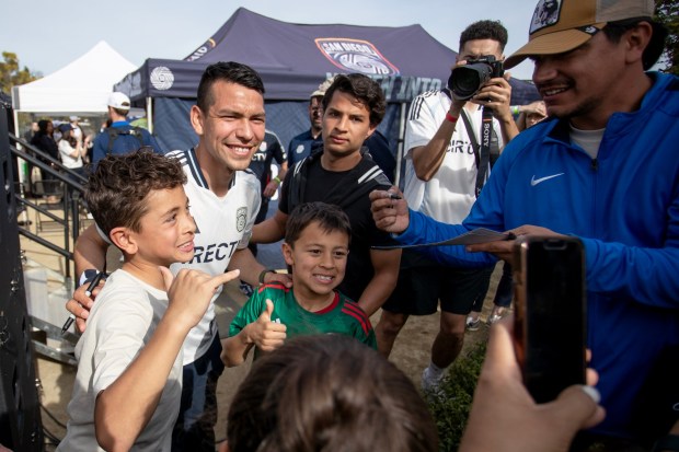 San Diego FC player Chucky Lozano poses with fans during the 2025 SDFC Season Launch Party hosted at Snapdragon Stadium in San Diego, CA. (Xavier Hernandez for the UT)