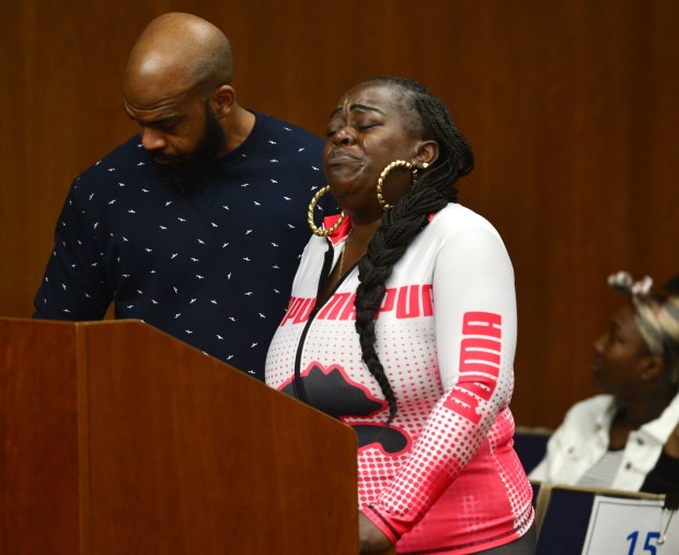 Michelle Miller, mother of victim Michael Radford, gives a statement thru tears as victim advocate Antione Norman lends support. Reginald Leander Wallace was sentenced Friday Sept. 30, 2022, in Torrance Superior Court for three counts of first-degree murder and four counts of attempted murder for shooting at a brawling crowd at Gable House Bowl in Torrance in January 2019. He received life sentence without possibility of parole. (Photo by Robert Casillas, Contributing Photographer)