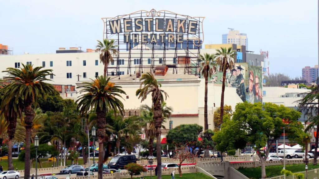 Westlake Theatre sign above palm trees