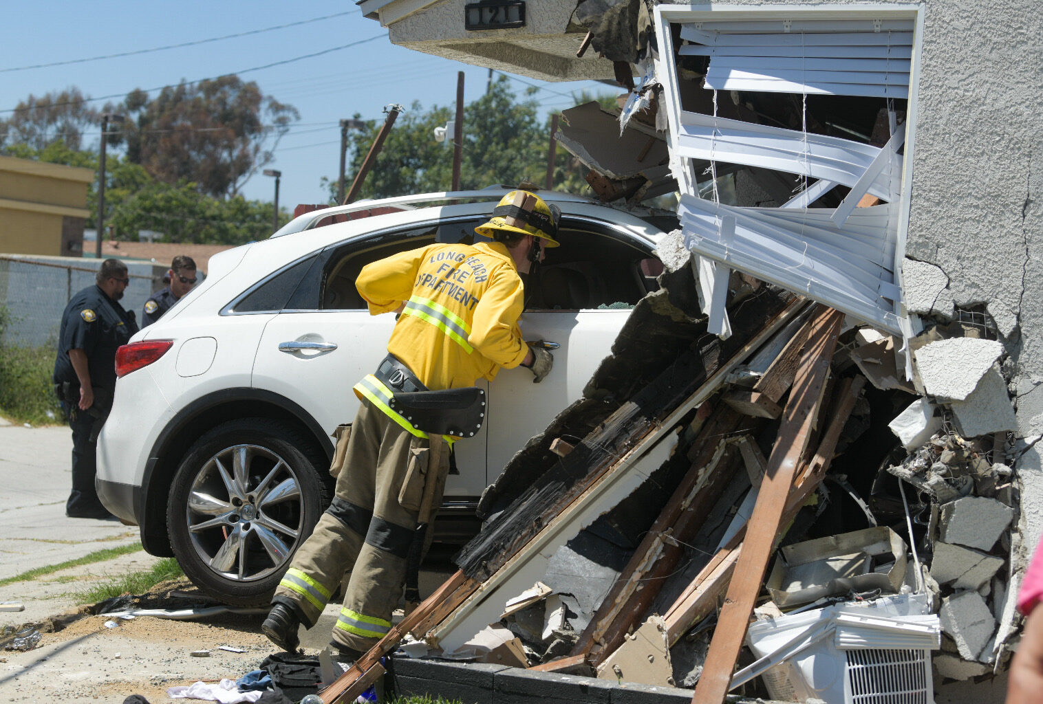 Long Beach woman asks for help after car crashes into her house, ruining her small business • Long Beach Post News