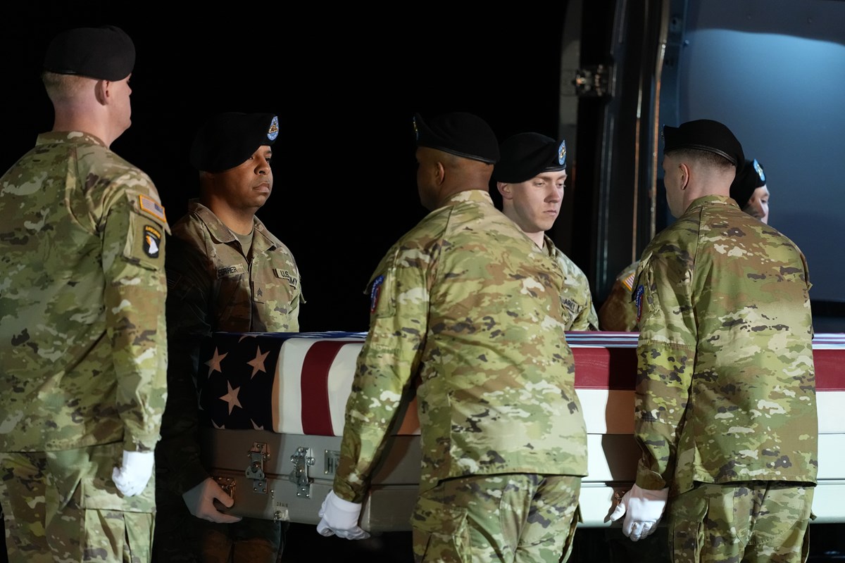 A U.S. Army carry team places the transfer case with the remains of U.S. Army Sgt. Benjamin N. Pennington, 26, of Glendale, Ky. in the the transfer vehicle during a dignified transfer Monday, March 9, 2026, at Dover Air Force Base.