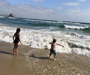 Huntington Beach has some of the best beaches for kids in Orange County. Photo by Gabby Cullen