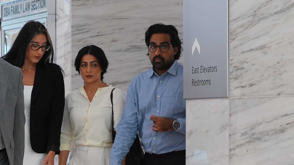 California couple confront their surrogate in a Texas court