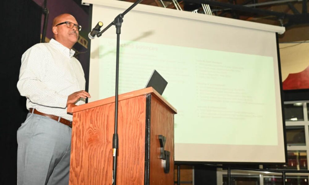 Port Commissioner and Maritime Attorney Derrick Muhammad delivers a speech at Youth Uprising in East Oakland on Saturday, July 25. Photo by Graig Brooks.