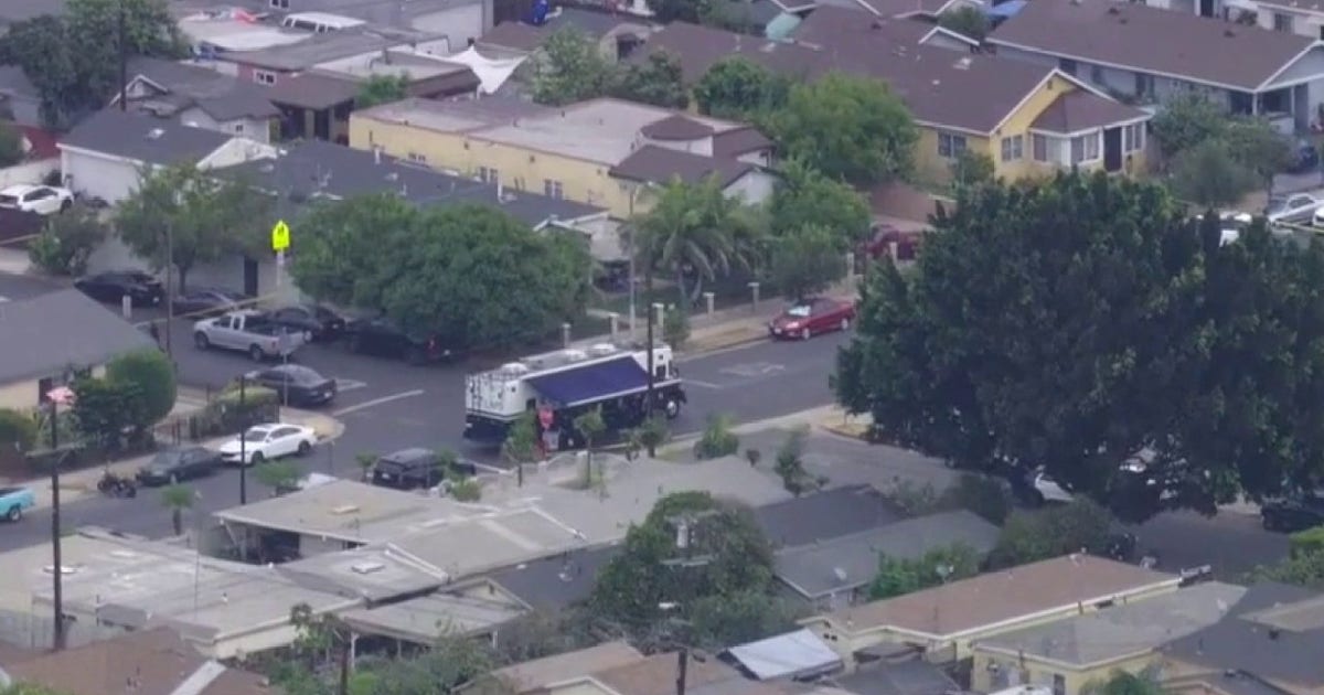 Officer bitten, dog shot after LAPD responds to domestic dispute call in South LA