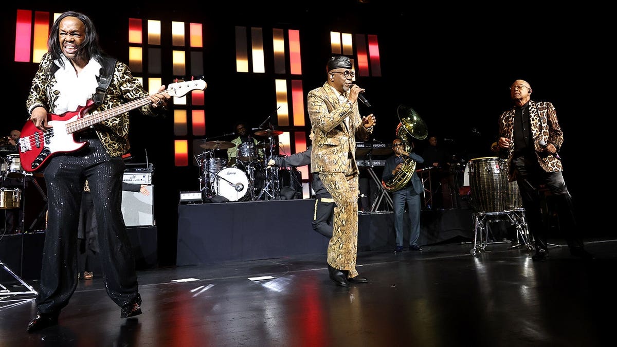 Verdine White, Philip Bailey, and Ralph Johnson of Earth, Wind & Fire performing onstage at Beacon Theatre in New York City