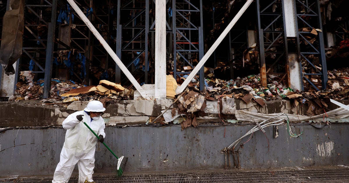 Cleanup in aftermath of the Linage Warehouse fire.