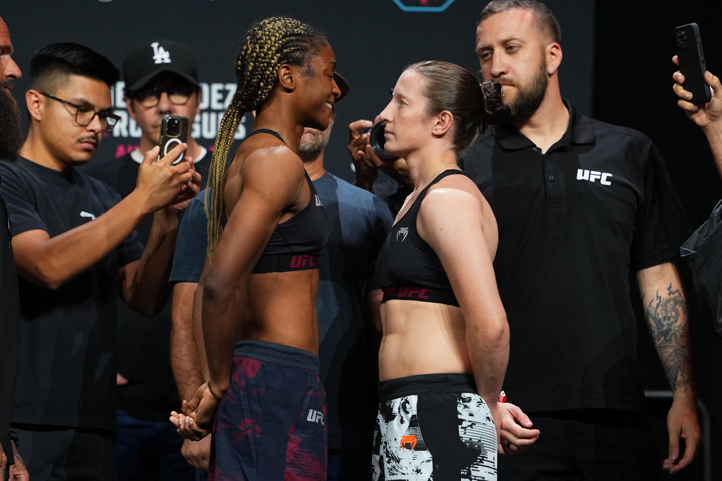 SACRAMENTO, CALIFORNIA - AUGUST 21: (L-R) Opponents Shanelle Dyer of England and Elise Reed face off during the UFC Fight Night ceremonial weigh-in at Golden 1 Center on August 21, 2026 in Sacramento, California. (Photo by Jeff Bottari/Zuffa LLC)