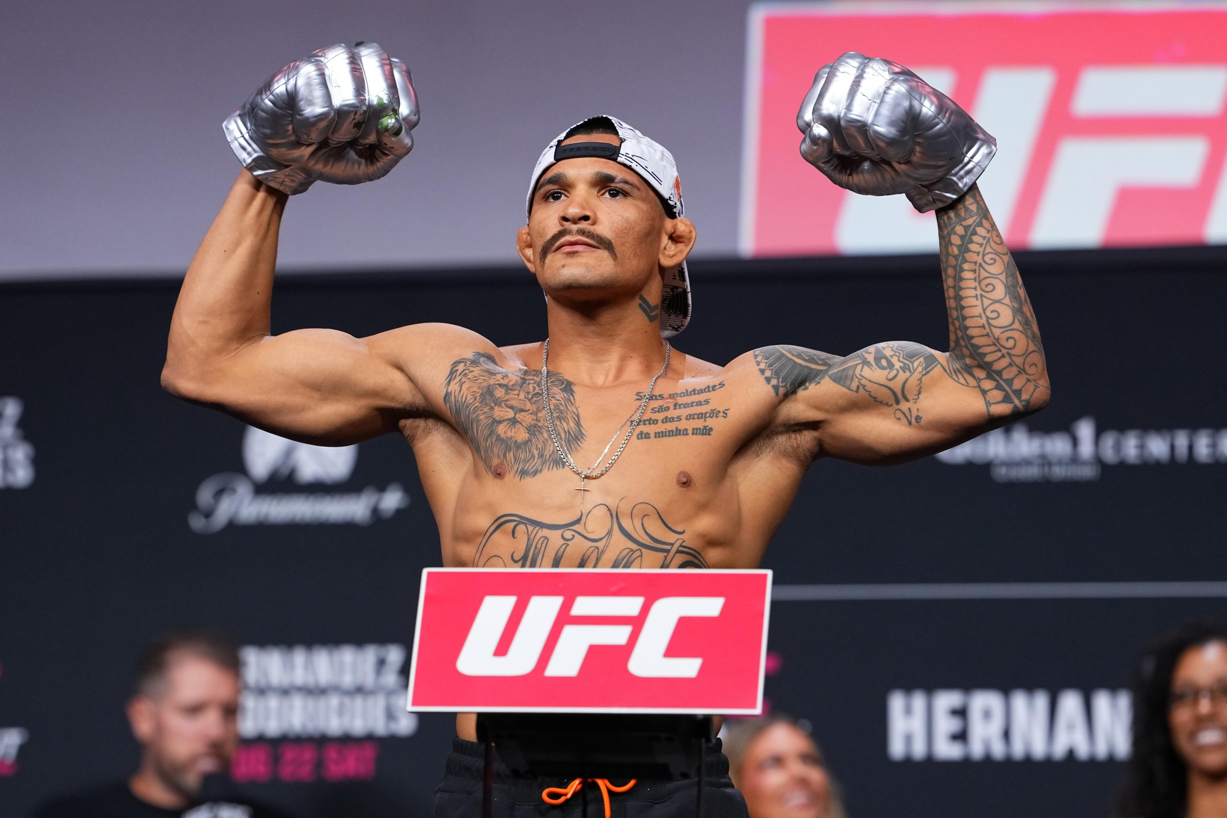 SACRAMENTO, CALIFORNIA - AUGUST 21: Marcio Barbosa of Brazil poses on the scale during the UFC Fight Night ceremonial weigh-in at Golden 1 Center on August 21, 2026 in Sacramento, California. (Photo by Jeff Bottari/Zuffa LLC)