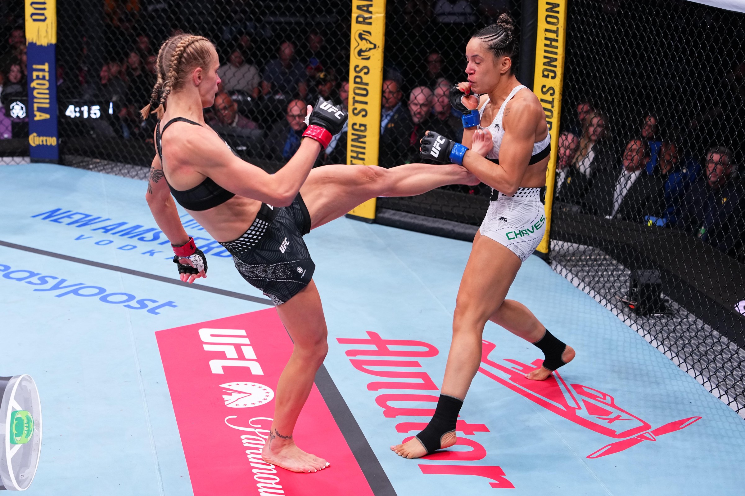 SACRAMENTO, CALIFORNIA - AUGUST 22: (L-R) Carli Judice kicks Jeisla Chaves of Brazil in a flyweight fight during the UFC Fight Night event at Golden 1 Center on August 22, 2026 in Sacramento, California. (Photo by Jeff Bottari/Zuffa LLC)