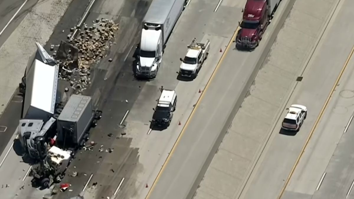 Big Rig Flips Over, Sends Boxes Across California Freeway in Wild Crash