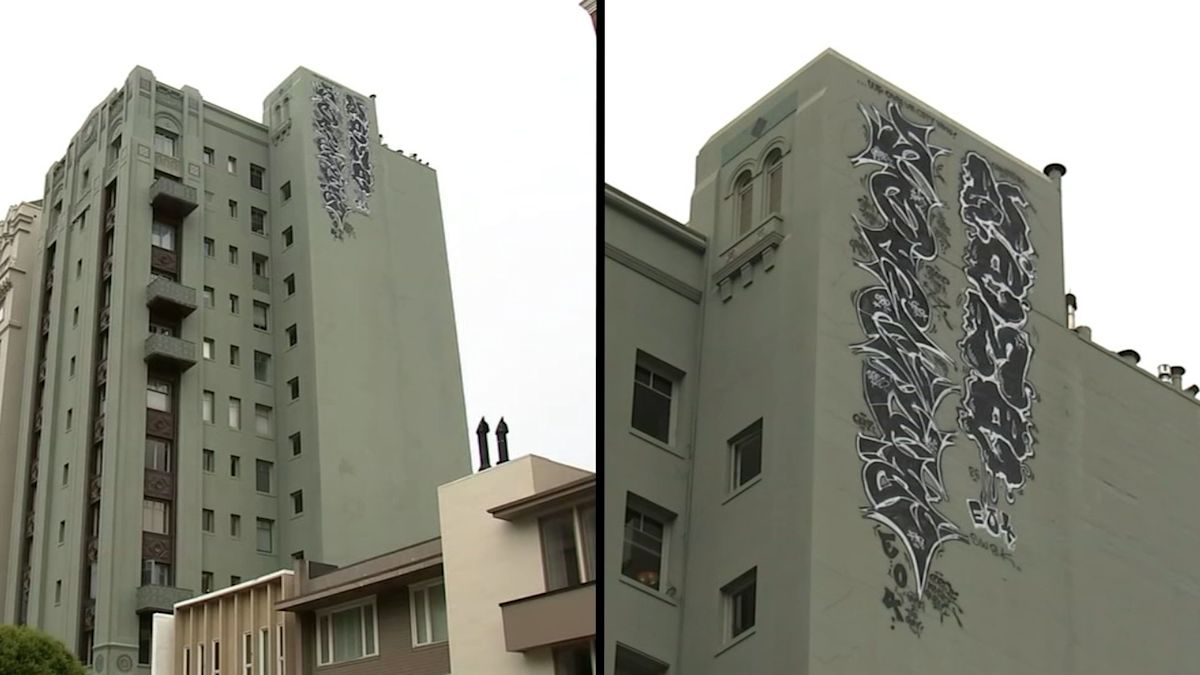 Graffiti atop SF Pacific Heights building draws mixed reactions. How did it get up there?