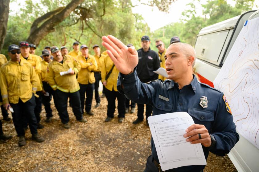 Federal wildfire crews are stretched thin. California is stepping in to help