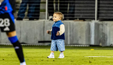 Adorable interruption! Baby pitch invader crashes San Jose-Minnesota