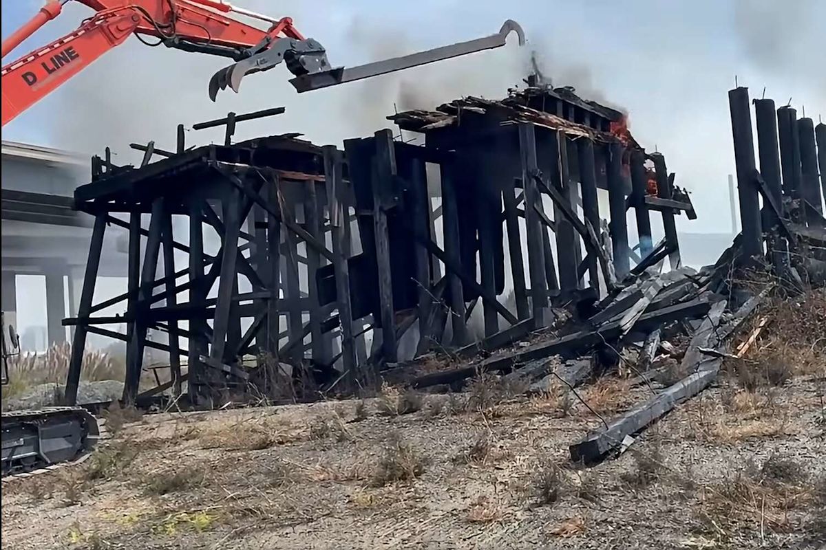 Oakland firefighters demolish abandoned railway trestle after controlling blaze