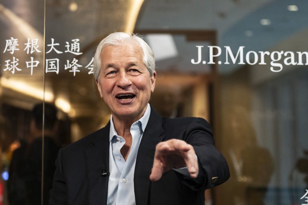 Jamie Dimon, CEO of JPMorgan Chase & Co., gestures while speaking at the JPMorgan China Summit in Shanghai.