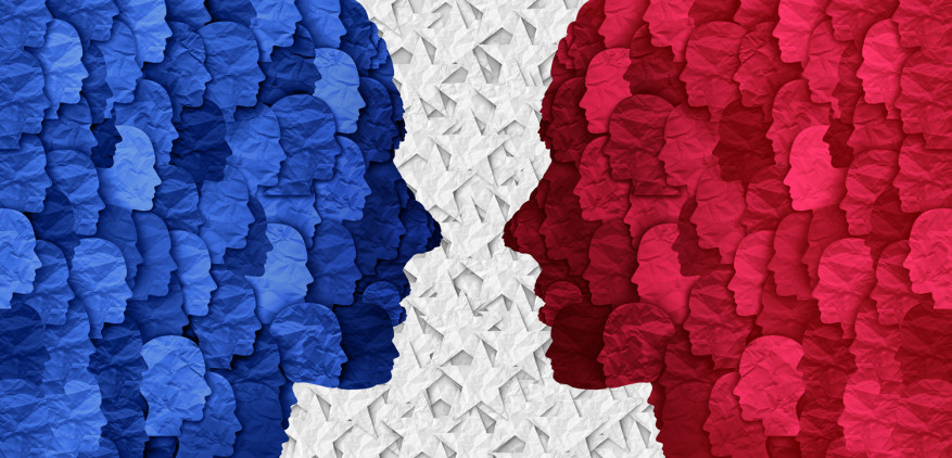 Two profiles of human face - one is red, one is blue.