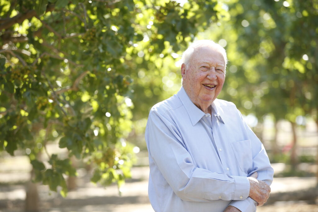 Rodger Jensen in pistachio orchard