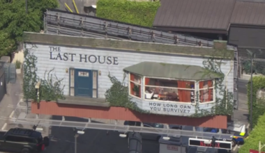 Man living inside billboard above Los Angeles' Sunset Strip for Netflix movie promotion