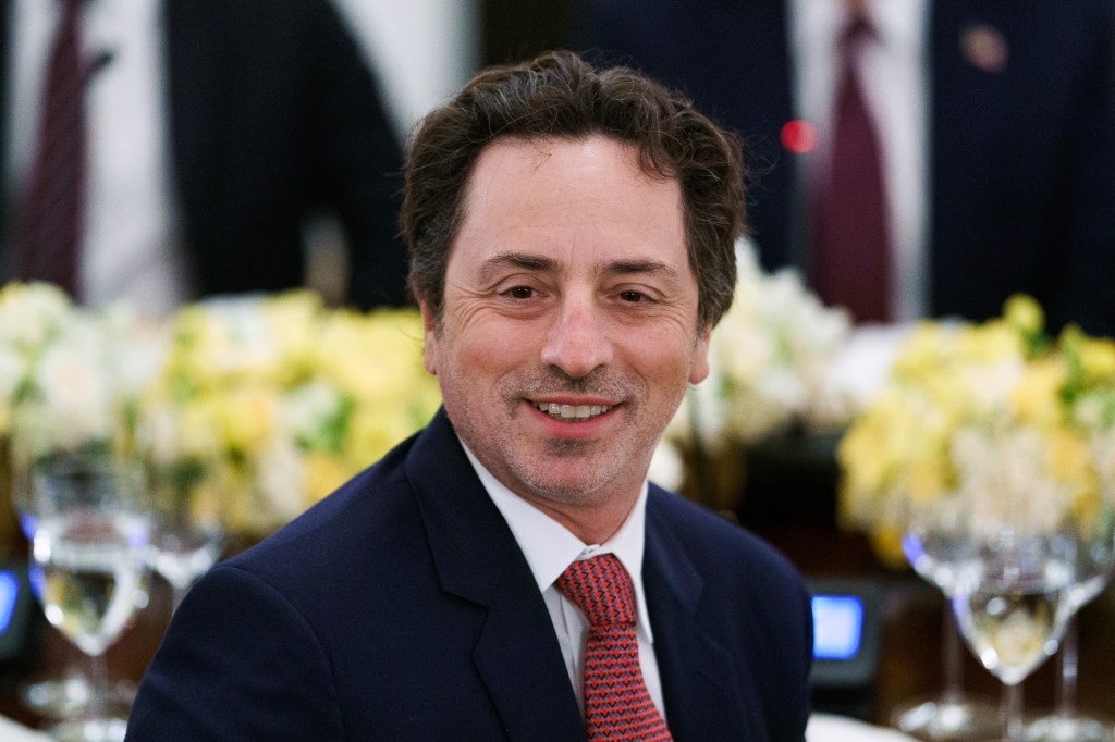 Sergey Brin, president of Alphabet and co-founder of Google Inc., smiling during a dinner with tech leaders in the State Dining Room of the White House.