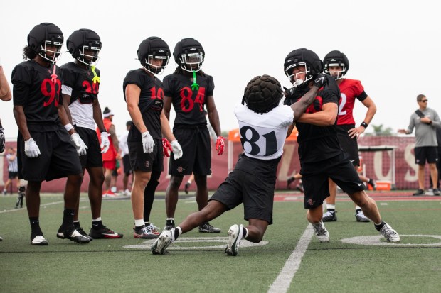SDSU football players work drills during the team's first practice at San Diego State University on Wednesday, August 5, 2026. (Kristian Carreon / The San Diego Union-Tribune)
