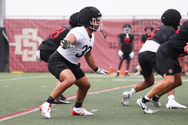 San Dieg State edge rusher Brady Nassar runs a drill during the team's first practice at San Diego State University on Wednesday, August 5, 2026. (Kristian Carreon / The San Diego Union-Tribune)