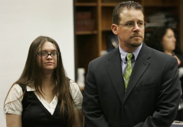 Brae Hansen, left, with her attorney, San Diego County Deputy Public Defender Troy Britt, on March 23, 2009, during opening statements in the trial for the 2007 slaying of her stepfather, La Mesa criminal defense lawyer Timothy MacNeil. (Howard Lipin / U-T file)