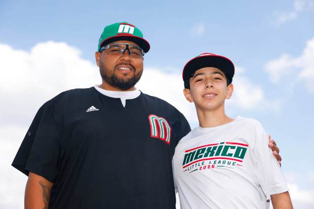 Tijuana Municipal coach Marcelo Santamaria and his nephew Gael Santamaria #8 pose for a photo near at Volunteer Stadium on Saturday, Aug. 22, 2026 in South Williamsport, Pennsylvania. (Meg McLaughlin / The San Diego Union-Tribune)