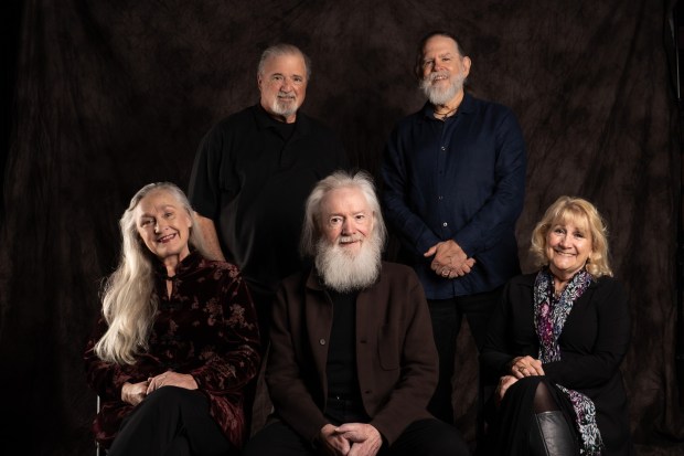 The longtime artistic leadership team at Lamb's Players Theatre in Coronado are preparing to retire at the end of 2026. They are, front row from left, Associate Artistic Director Deborah Gilmour Smyth, Producing Artistic Director Robert Smyth, Associate Artistic Director Kerry Meads. Back row from left, Art Director Christian Turner and Production Team Director Nathan Peirson. (Dave Rumley)