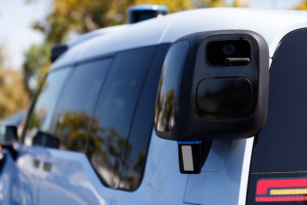 Sensors equipped with a camera, radar and lidar are attached on the rear of the Waymo Ojai. (Kristian Carreon / The San Diego Union-Tribune)