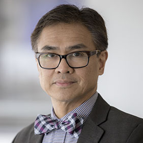 Primo "Lucky" Lara, director, UC Davis Comprehensive Cancer Center, in a bowtie and suit jacket. 