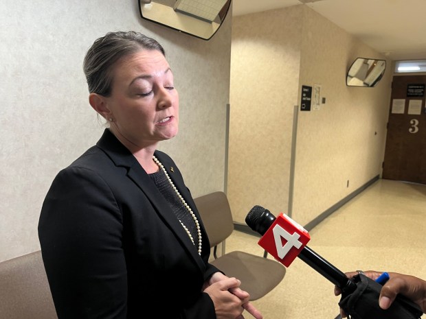 Shelly Rood, a longtime friend of Julie Fathbruckner, speaks to reporters after the arraignment hearing. (MITCH HOTTS -- THE MACOMB DAILY)