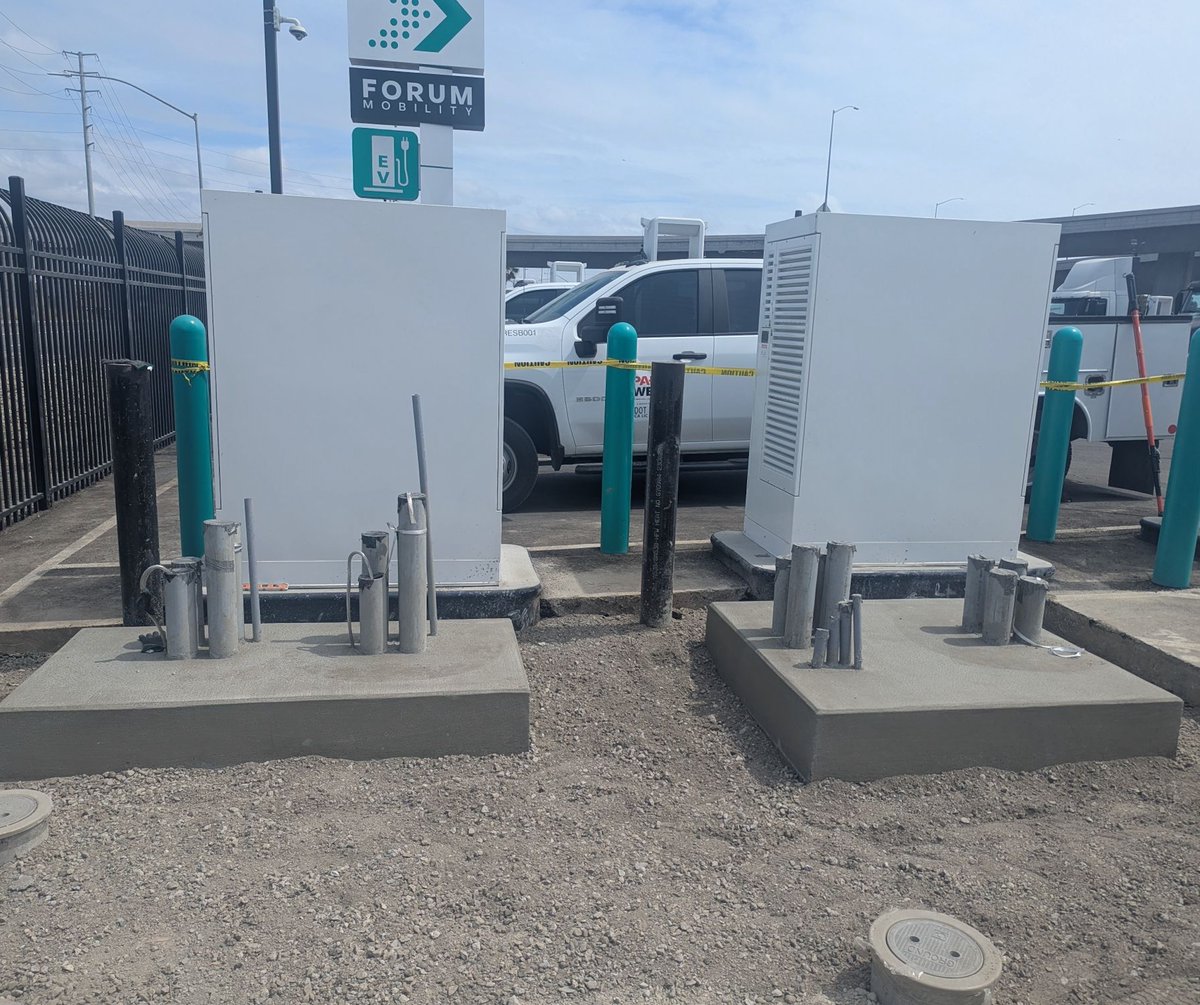 Close-up of Tesla Megacharger hardware with MCS connector at Port of Long Beach