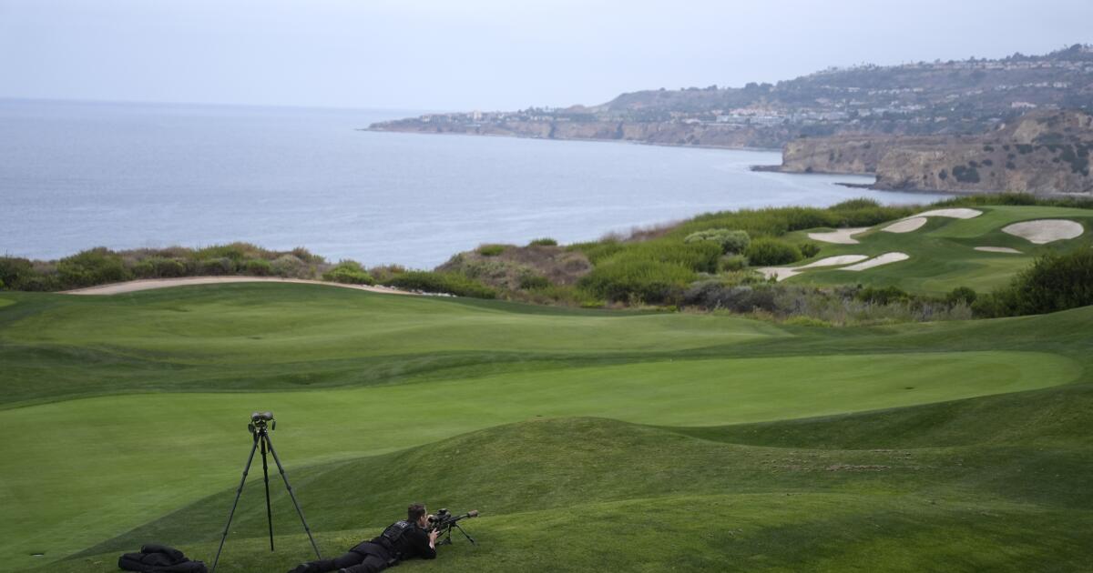 Heavily armed man arrested at Trump golf club before president's visit faces federal charge