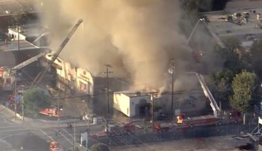Massive fire destroys Santa Clarita business, threats neighboring buildings